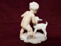 Figurka porcelanowa ''Chłopiec z koziołkiem''.