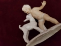 Figurka porcelanowa ''Chłopiec z koziołkiem''.