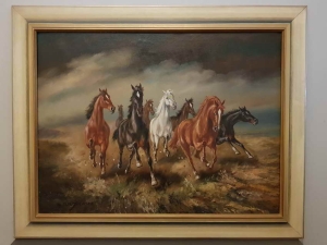 HANS  RIEDMANN    Dzikie konie  w galopie 
